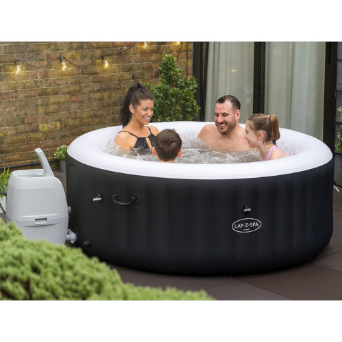 Family of four in Miami Hot Tub hired in Camberley from Kingdom of Castles