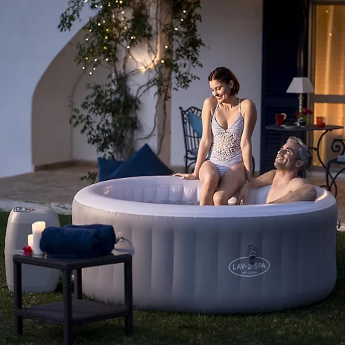 Couple in St Lucia Hot Tub hired in Farnborough from Kingdom of Castles